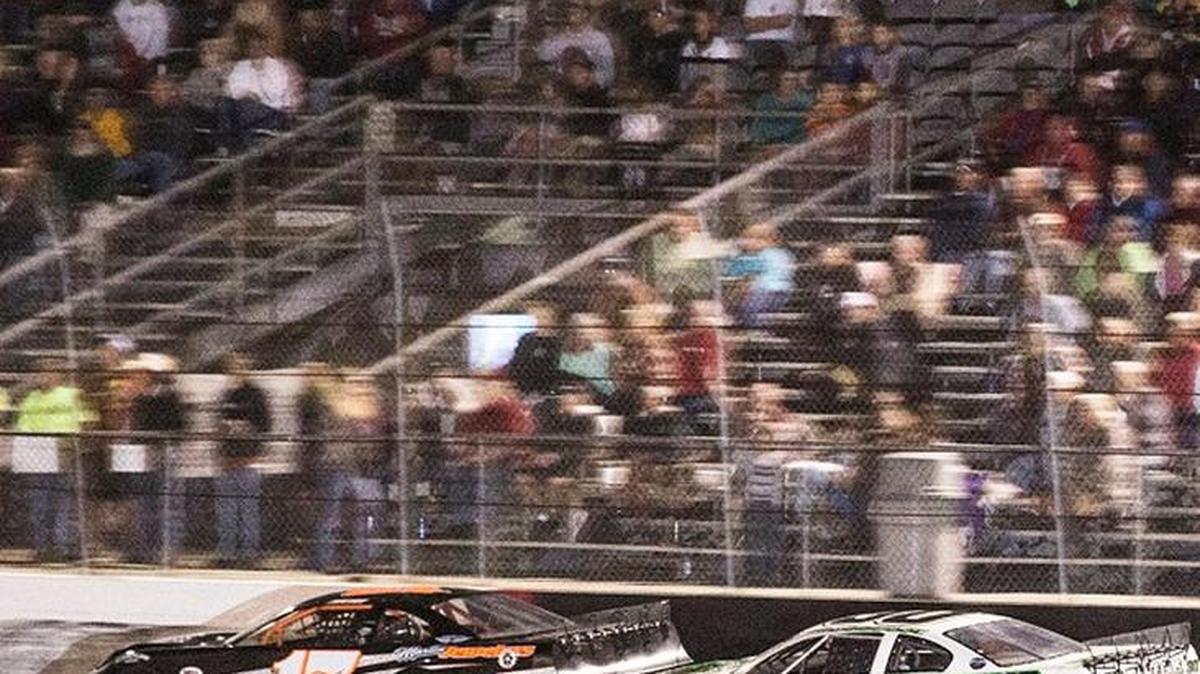 Jesse Dutilly, driving car number 30, tries to make a pass during the headling race of Saturday’s card at Desoto Speedway, the Icebreaker 100, in the Sunshine State Challenge Series Super Late Models series.